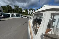 2019 Nimbus W 9 boat with Lake Constance registration, parked near modern buildings.