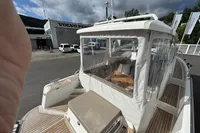 2019 Nimbus W 9 boat with Lake Constance registration, docked near Volvo Penta building.