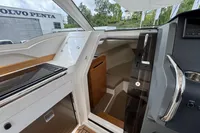 Interior view of 2019 Nimbus W 9 boat, featuring modern kitchen and control area.