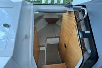 2019 Nimbus W 9 cabin interior with wood accents and seating.
