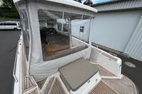 2019 Nimbus W 9 boat with canopy, teak deck, and seating, Lake Constance registration.