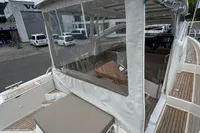 2019 Nimbus W 9 boat with Lake Constance registration, featuring teak deck and covered seating area.