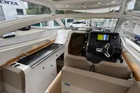 Interior of 2019 Nimbus W 9 boat with modern helm and kitchenette.