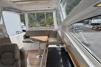 Interior of 2019 Nimbus W 9 boat with seating and kitchenette, Lake Constance registration.