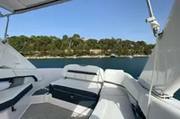 2019 Regal 26 FasDeck boat interior with scenic water and forest view.