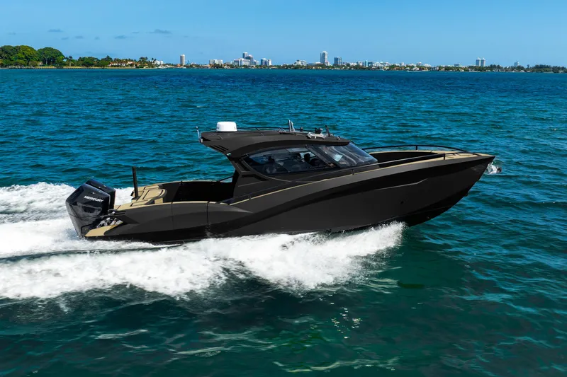  Yacht Photos Pics 2025 Novielli SERE luxury boat cruising on blue ocean waters.