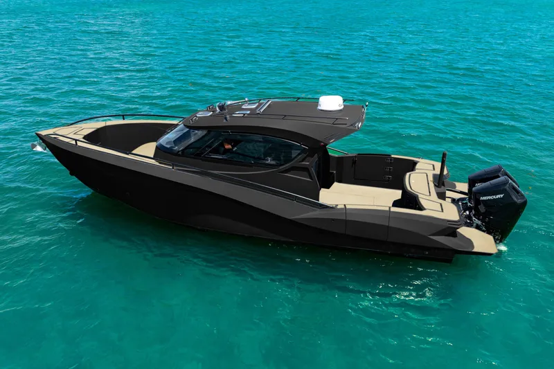  Yacht Photos Pics 2025 Novielli SERE luxury boat on turquoise water, featuring sleek black design and powerful Mercury engine.