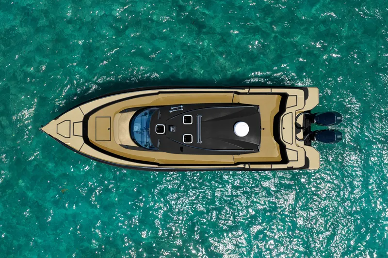  Yacht Photos Pics Top view of 2025 Novielli SERE boat on clear turquoise water.