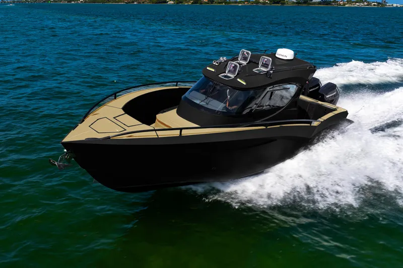  Yacht Photos Pics 2025 Novielli SERE boat cruising on open water, showcasing sleek design and powerful performance.