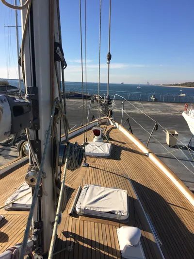 Challenger Yacht Photos Pics 1992 Hallberg-Rassy 45 sailboat deck with ocean view, featuring teak wood and rigging.