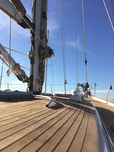 Challenger Yacht Photos Pics Deck view of 1992 Hallberg-Rassy 45 sailboat under clear blue sky.