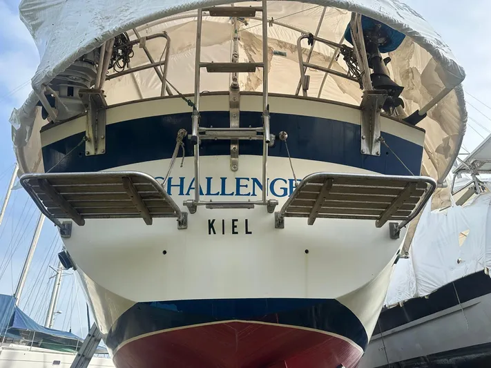 Challenger Yacht Photos Pics 1992 Hallberg-Rassy 45 sailboat stern view, docked, with "Kiel" visible.
