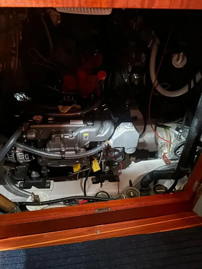 Challenger Yacht Photos Pics Engine compartment of a 1992 Hallberg-Rassy 45 sailboat, showcasing mechanical components.