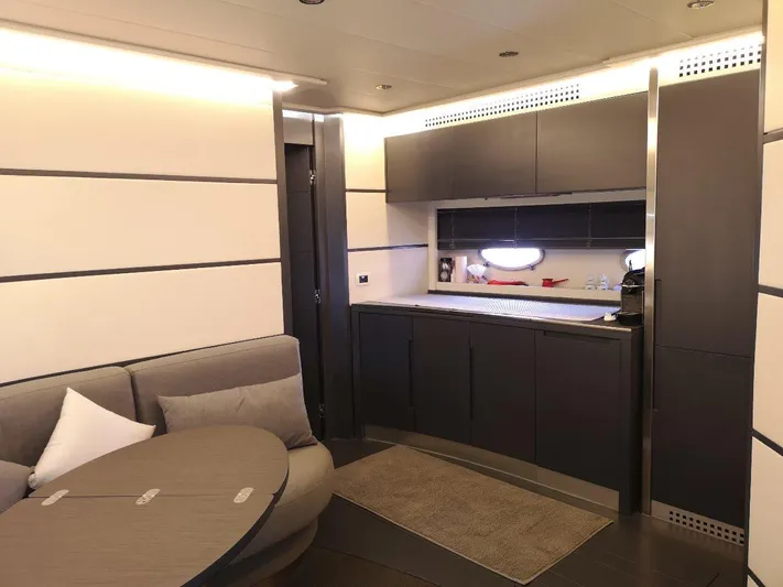  Yacht Photos Pics Luxurious interior of a 2007 Pershing 62 yacht with modern furnishings and sleek design.