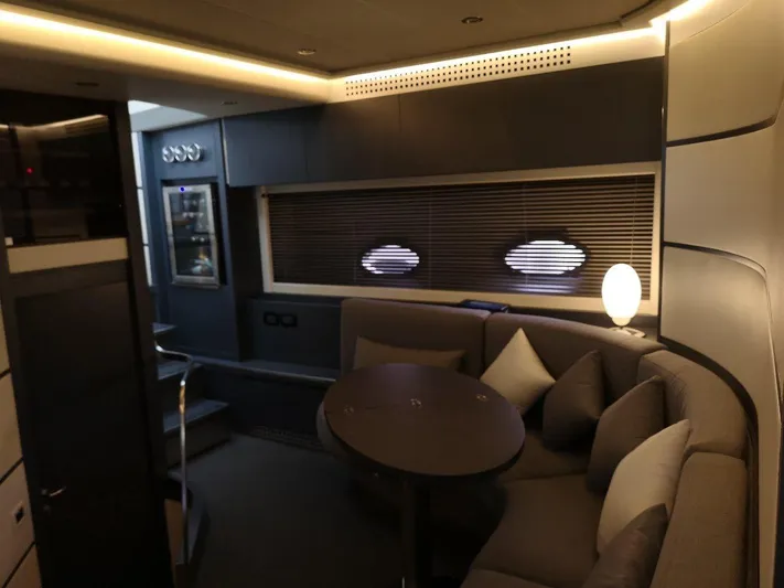  Yacht Photos Pics Luxurious interior of a 2007 Pershing 62 yacht with modern seating and ambient lighting.