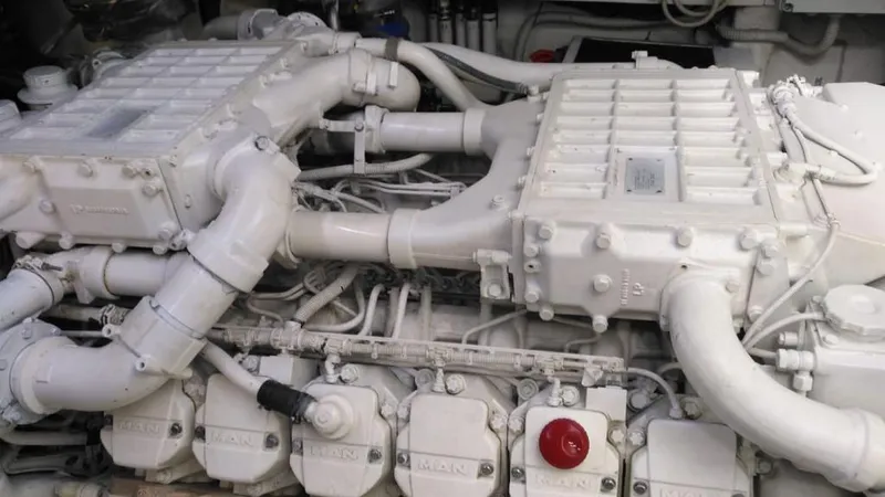  Yacht Photos Pics Engine of a 2007 Pershing 62 yacht, showcasing intricate mechanical components.