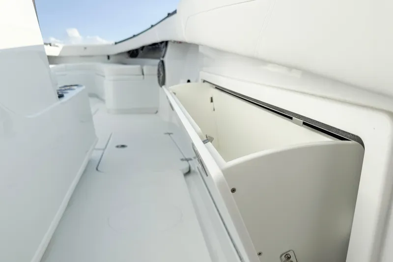  Yacht Photos Pics 2026 Yellowfin 34 Offshore boat interior with open storage compartment.
