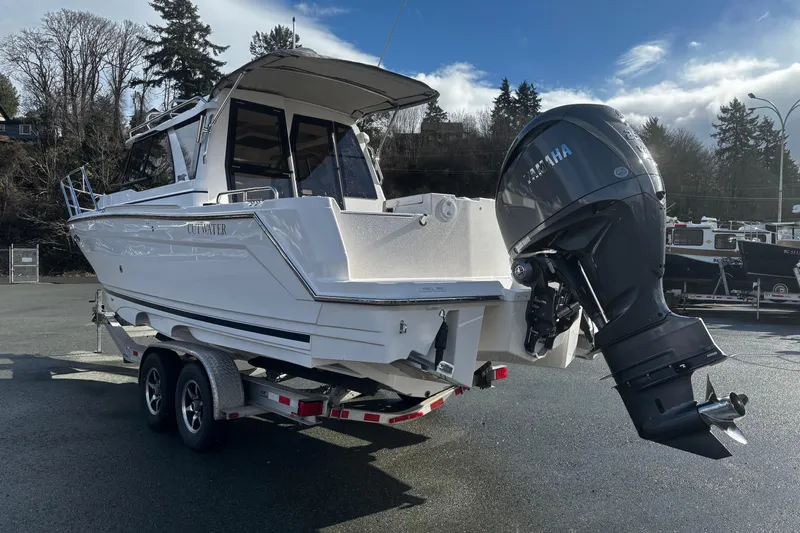  Yacht Photos Pics 2026 Cutwater C-248 Coupe boat on trailer with Yamaha outboard motor.