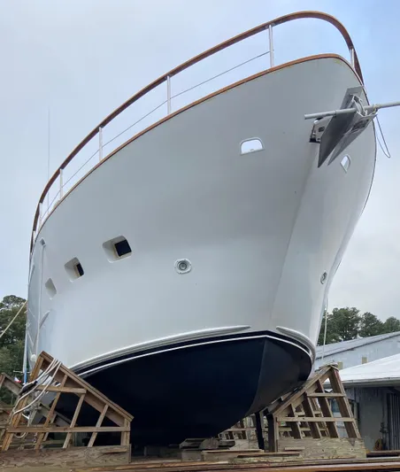  Yacht Photos Pics Pluckebaum Custom 2000 yacht on dry dock, showcasing sleek design and craftsmanship.