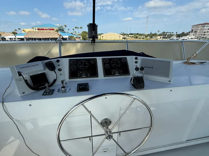  Yacht Photos Pics Helm of 2000 Pluckebaum Custom boat with navigation instruments and steering wheel.