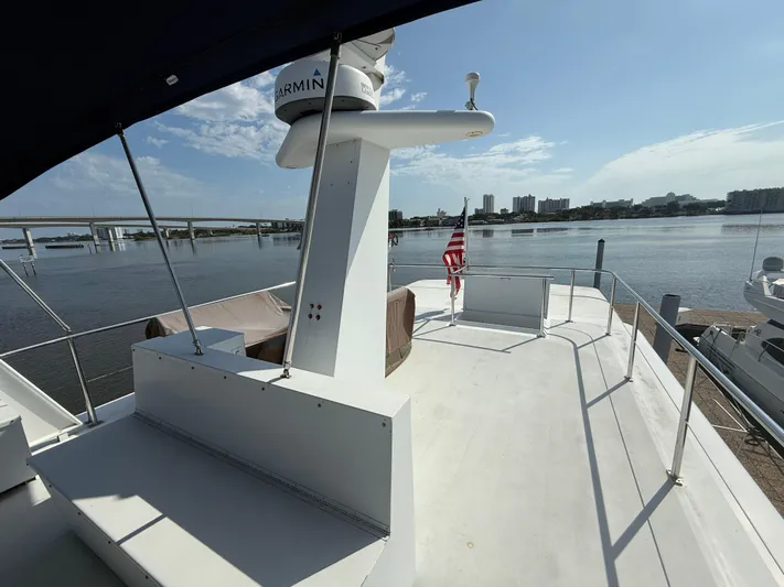  Yacht Photos Pics Pluckebaum Custom 2000 yacht deck with cityscape and bridge view.