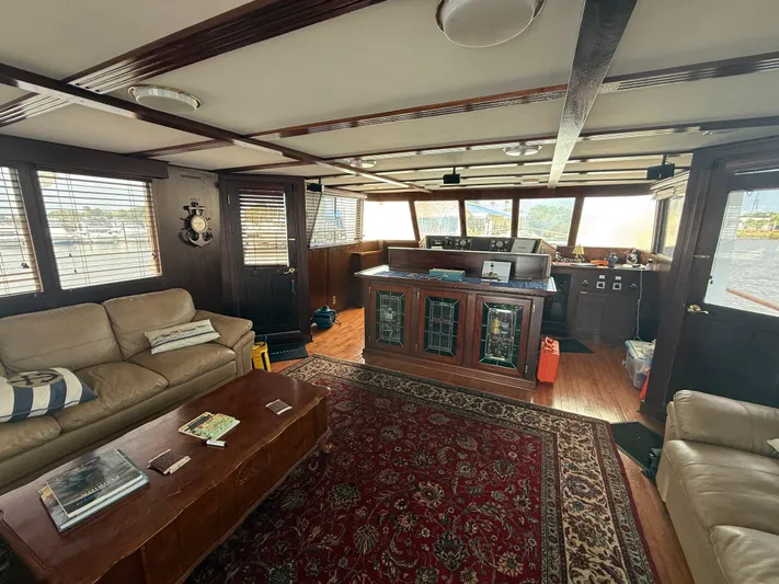  Yacht Photos Pics Luxurious 2000 Pluckebaum Custom yacht interior with leather seating and elegant wood finishes.