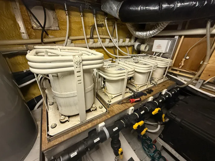  Yacht Photos Pics Electrical components and wiring in a 2000 Pluckebaum Custom boat engine room.