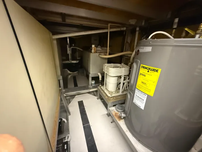  Yacht Photos Pics Pluckebaum Custom 2000 engine room with water heater and mechanical equipment.