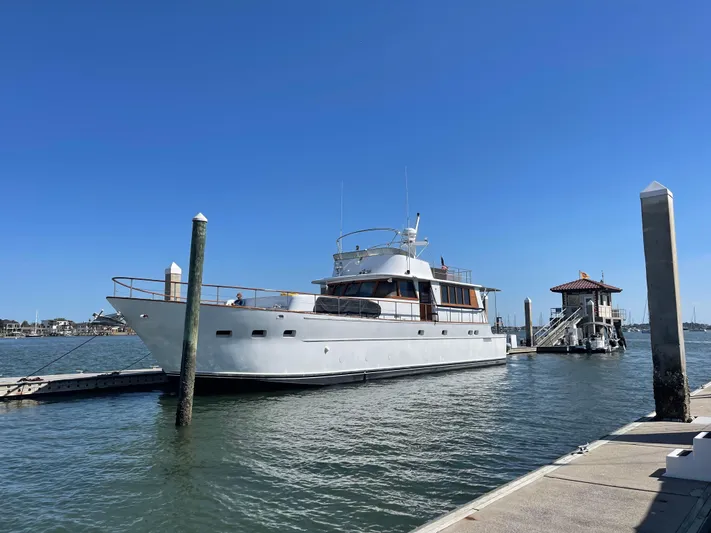  Yacht Photos Pics Luxury 2000 Pluckebaum Custom yacht docked at marina under clear blue sky.
