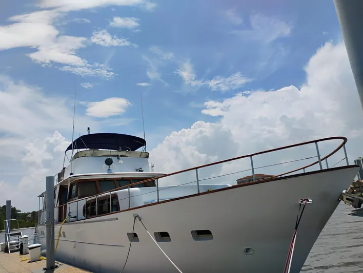  Yacht Photos Pics Luxury Pluckebaum Custom yacht docked under a bright blue sky, 2000 model.