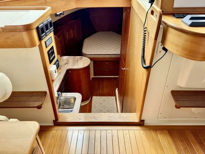 Linda Lou Yacht Photos Pics Interior of a 2018 Legacy 36 yacht with wooden finish.