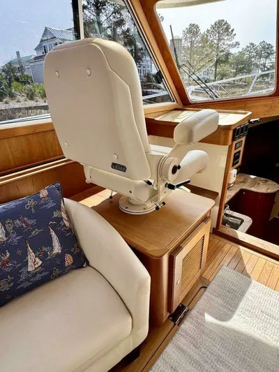 Linda Lou Yacht Photos Pics Interior of a 2018 Legacy 36 yacht with captain's chair.