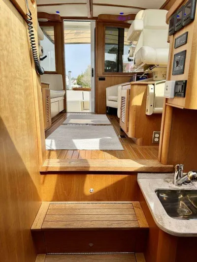 Linda Lou Yacht Photos Pics Interior of a 2018 Legacy 36 yacht with wooden finish.