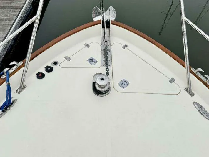 Linda Lou Yacht Photos Pics Bow of a 2018 Legacy 36 boat with anchor and chain guide.