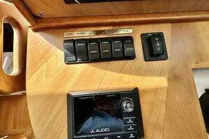 Linda Lou Yacht Photos Pics Legacy 36 boat console with switches and JL Audio system, year 2018.