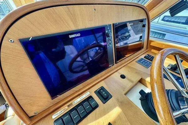 Linda Lou Yacht Photos Pics Helm console of a 2018 Legacy 36 boat.