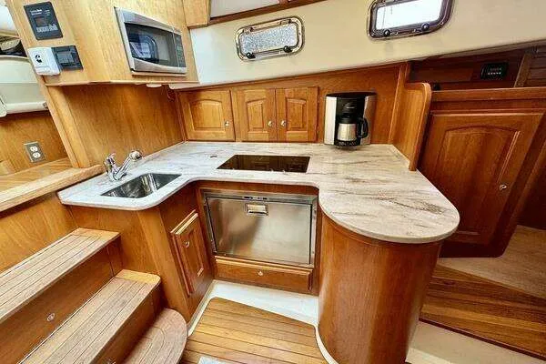 Linda Lou Yacht Photos Pics Interior view of Legacy 36 yacht kitchen, 2018 model.