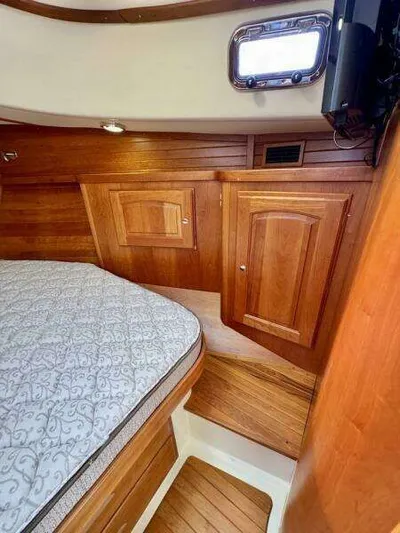Linda Lou Yacht Photos Pics Interior of a 2018 Legacy 36 yacht with wooden finish.