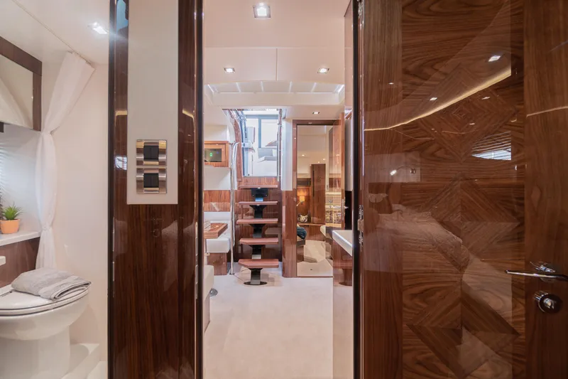 Lady C Yacht Photos Pics Luxurious interior of 2022 Galeon 485 HTS yacht with elegant wood finishes.