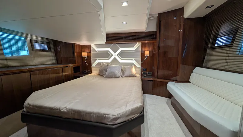 Lady C Yacht Photos Pics Luxurious interior of 2022 Galeon 485 HTS yacht with elegant bedroom design.
