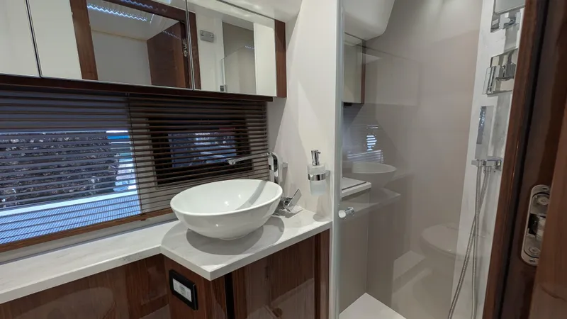 Lady C Yacht Photos Pics Luxurious bathroom interior of 2022 Galeon 485 HTS yacht with modern fixtures and elegant design.
