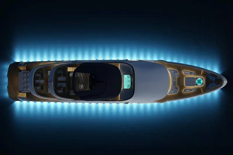  Yacht Photos Pics Aerial view of illuminated 2027 KRC Yachts Sagitta, showcasing sleek design and vibrant lighting.