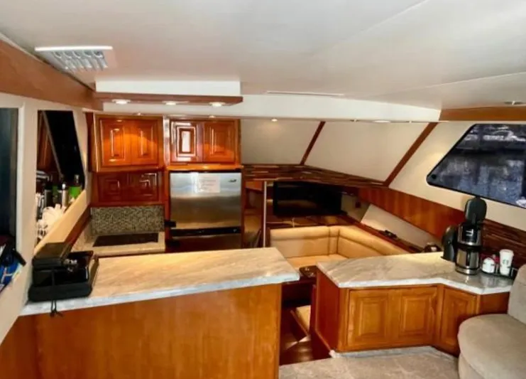  Yacht Photos Pics Interior of 1994 Viking 38 Convertible yacht with wood cabinetry and modern appliances.