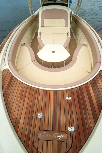 Lady Liberty Yacht Photos Pics 2018 Chris-Craft Catalina 34 boat with elegant wood deck and spacious seating area.