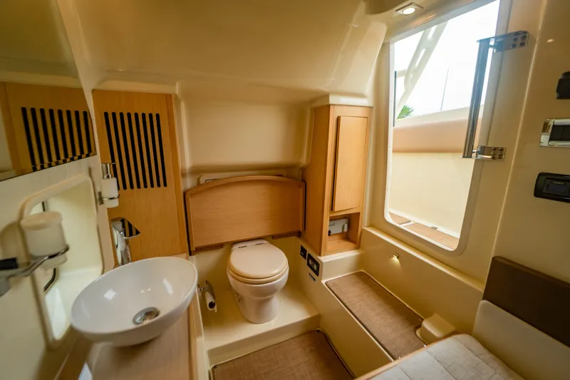 Lady Liberty Yacht Photos Pics Luxurious bathroom interior of 2018 Chris-Craft Catalina 34 boat with modern fixtures.