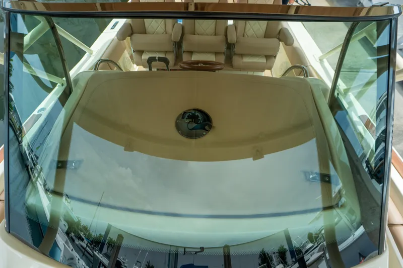 Lady Liberty Yacht Photos Pics 2018 Chris-Craft Catalina 34 boat interior with windshield and seating.