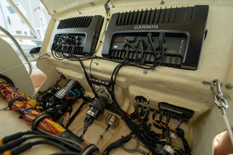 Lady Liberty Yacht Photos Pics Interior view of 2018 Chris-Craft Catalina 34 showing Garmin electronics and wiring setup.