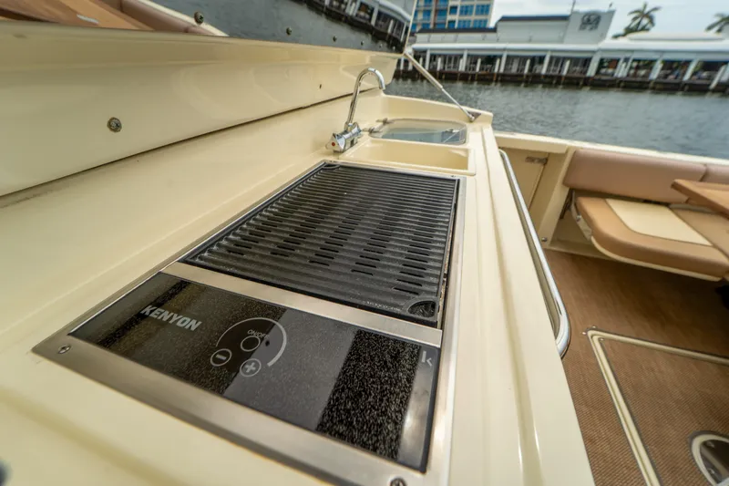 Lady Liberty Yacht Photos Pics Outdoor kitchen on 2018 Chris-Craft Catalina 34 boat with grill and sink.