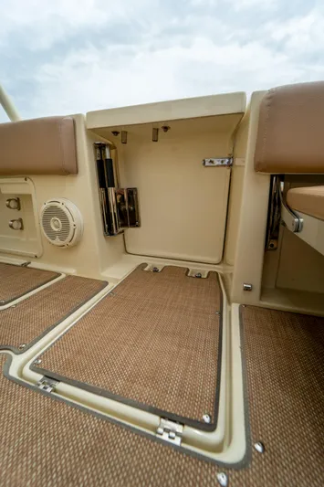 Lady Liberty Yacht Photos Pics 2018 Chris-Craft Catalina 34 interior with beige seating and carpeted flooring.