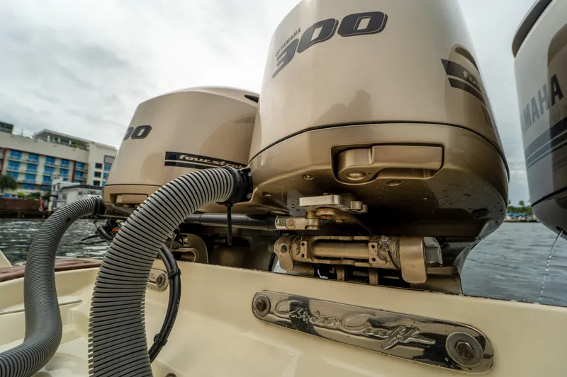 Lady Liberty Yacht Photos Pics 2018 Chris-Craft Catalina 34 with Yamaha 300 engines, docked near waterfront buildings.